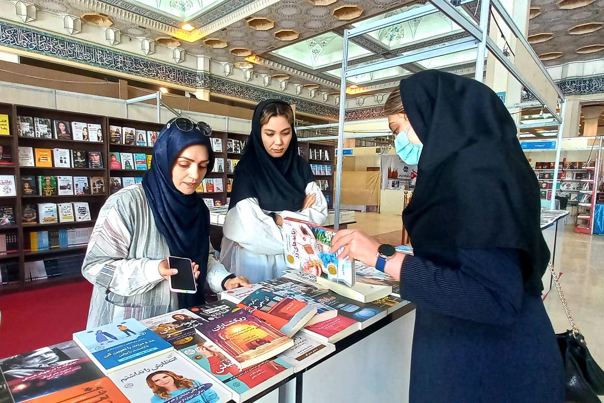 Officials of Khatam University's Library visited Tehran International Book Fair