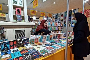 Officials of Khatam University's Library visited Tehran International Book Fair